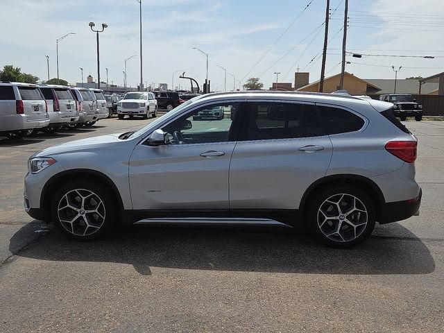 Used 2018 BMW X1 28i with VIN WBXHT3C31J5K29666 for sale in Plainview, TX